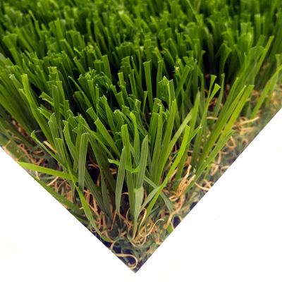 Grama artificial sobrenatural e ajardinar a grama artificial amigável do eco