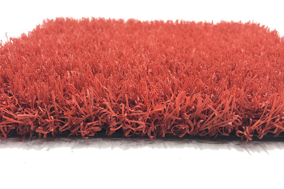 Desgaste sintético do quintal da grama dos esportes amigáveis vermelhos do animal de estimação - resistente